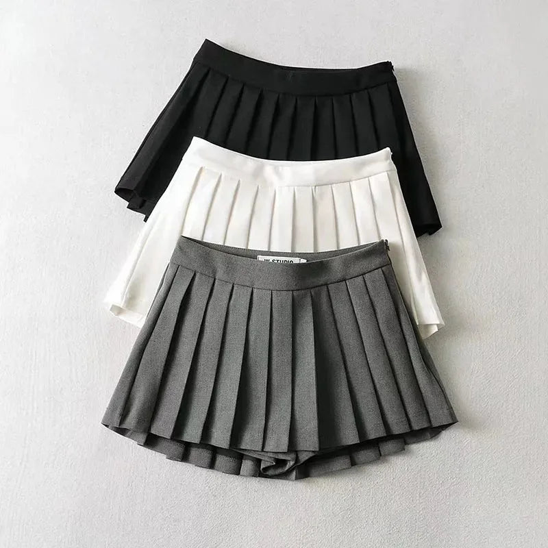 Spice girl pleated skirt female pure color small short skirt summer new Korean version JK college wind high waist mini skirt
