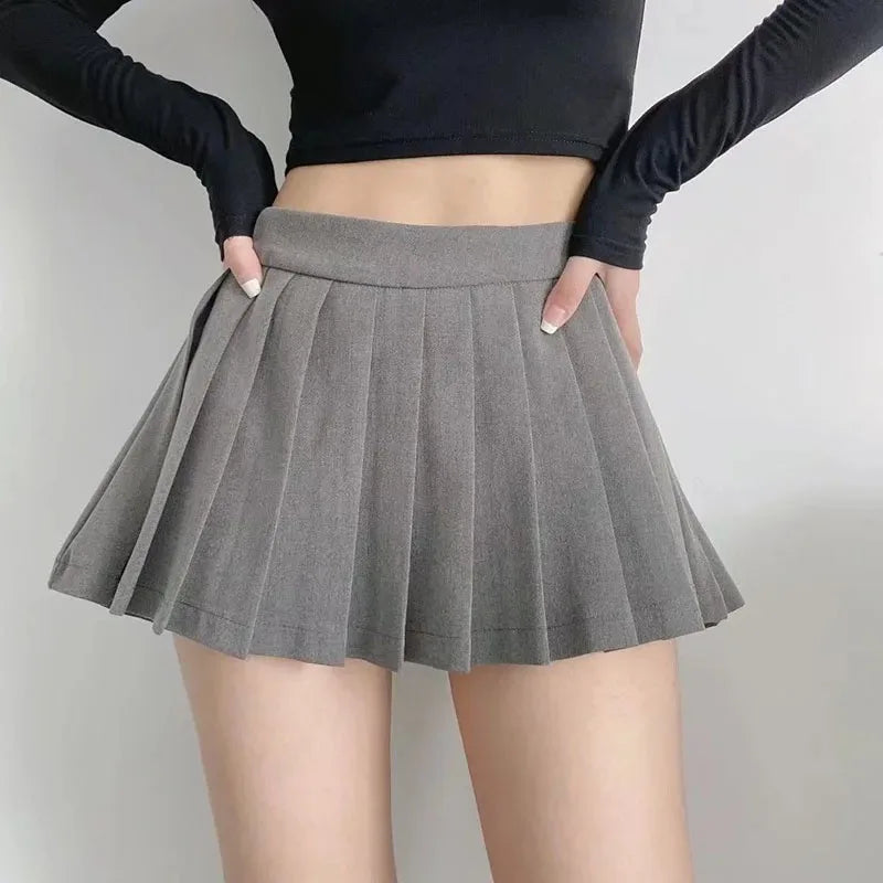 Spice girl pleated skirt female pure color small short skirt summer new Korean version JK college wind high waist mini skirt