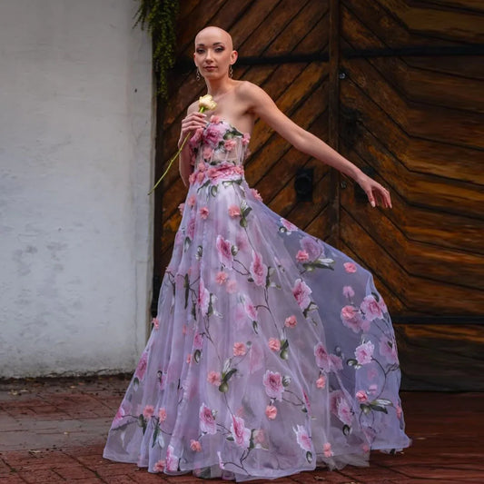 Ethereal Floral Print Gown With Pink Roses On Sheer Fabric Flowing Dress Strapless Design Highlighting Femininity And Grace