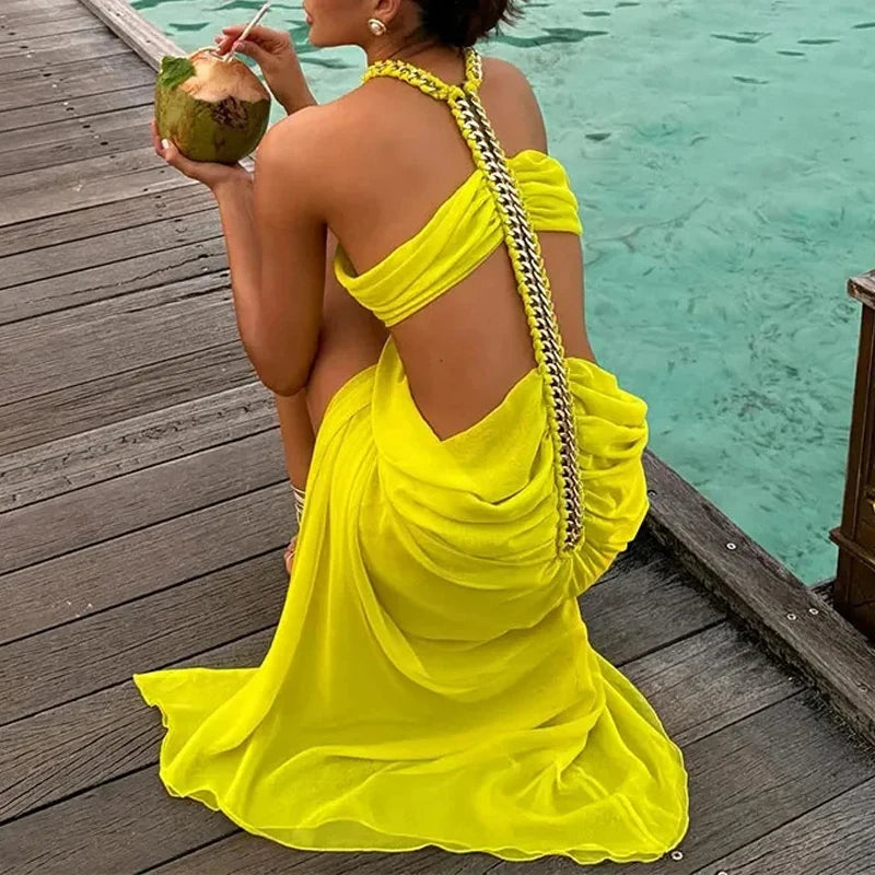 2025 women's backless sexy beach vacation dress with suspender collar   pleated metal chain, new elegant vacation dress design