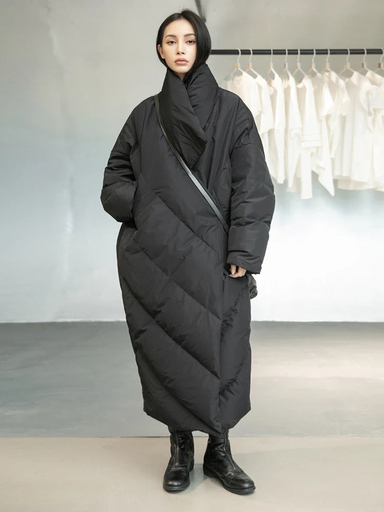 [EAM] Loose Fit Black Long Down Jacket New Stand Collar Long Sleeve Warm Women Parkas Fashion Tide Autumn Winter 2025 1DD1640