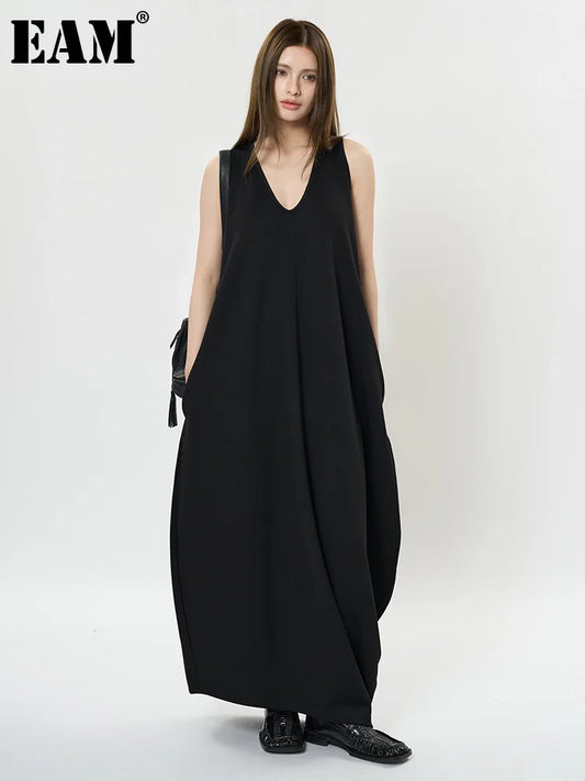 [EAM] Women Black Brief Irregular Shaped Pocket Long Elegant Dress New V-Neck Sleeveless Fashion Tide Spring Autumn 2025 1DH9419