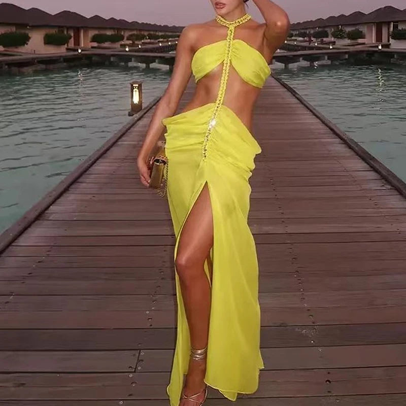 2025 women's backless sexy beach vacation dress with suspender collar   pleated metal chain, new elegant vacation dress design